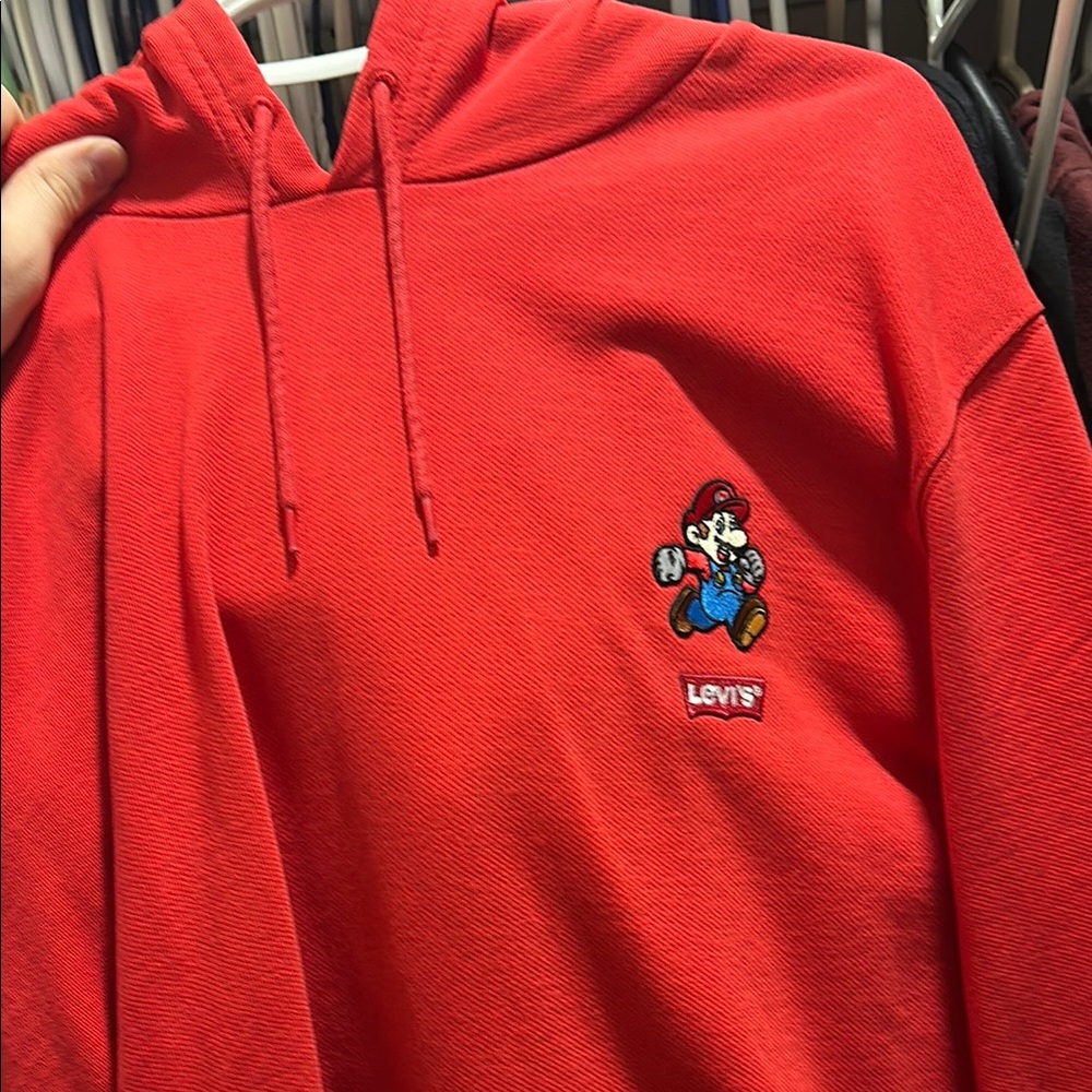 Levi's Red Fleece-Lined Sweater with Cartoon Design